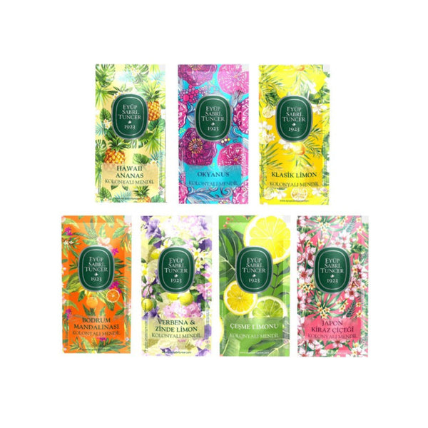 Seven Eyup Sabri Tuncer cologne wipe sachets in pineapple, ocean, citrus and cherry blossom designs