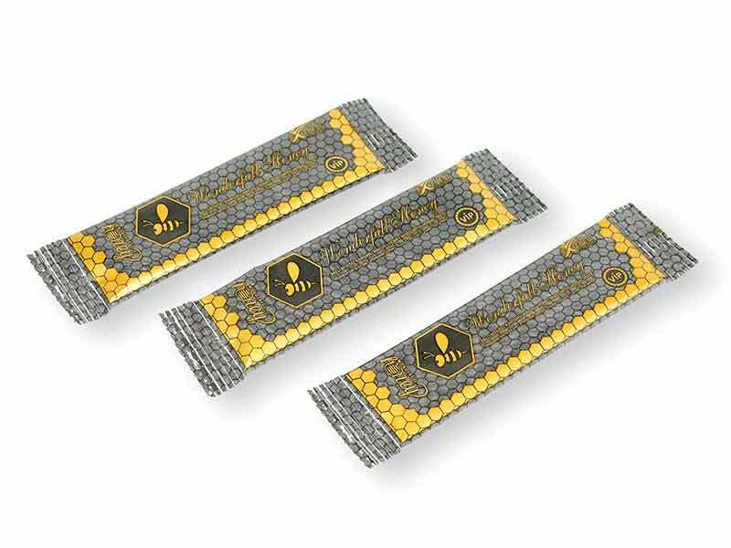 Translation missing: en.Wonderful Honey Natural Paste – close-up of individual sachets highlighting portion size and packaging design - Wonderful - accessibility.image_number 3