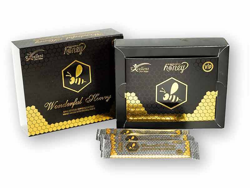 Translation missing: en.Wonderful Honey Natural Paste – angled view of the box with sachets partially revealed for visual appeal and branding - Wonderful - accessibility.image_number 4